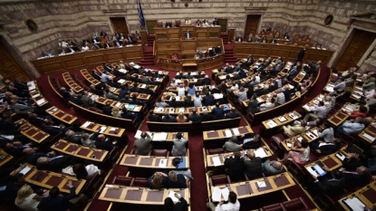 Greek lawmakers have approved the stringent terms of a $94 billion bailout