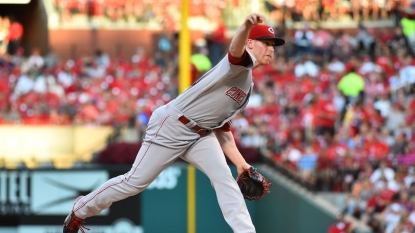 Holliday reinjured, Cardinals fall to Reds 1