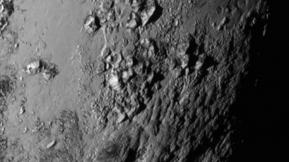 Pluto flypast reveals range of mountains