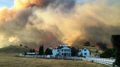 Northern California wildfire threatening structures