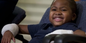 Boy who lost limbs to infection gets double-hand transplant