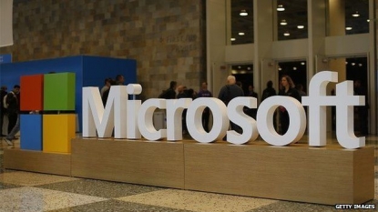 Microsoft books $8.4 billion write-down on phones, 4th quarter beats depressed