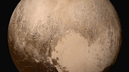 NASA’s New Horizons reveals; Pluto has Flowing ice and a red haze