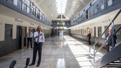 Obama visits federal prison