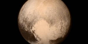 NASA Names Craterless Plain on Pluto After Tombaugh