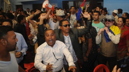 Protesters throw chairs at Nepal’s deputy prime minister