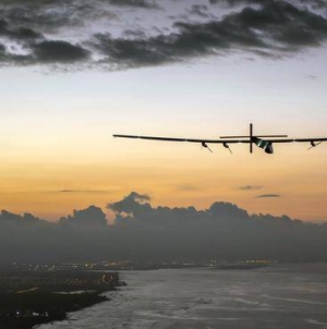 RT News: Solar-powered plane sets solo flight world record