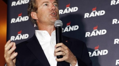 Rand Paul puts tax code in woodchipper