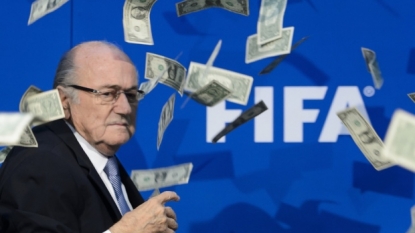 Blatter Thrown With Money By Prankster In Conference