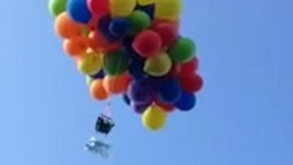 AOL Travel United Kingdom: Man arrested for flight in chair attached to balloons (video)