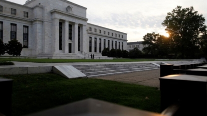 Fed directs 8 banks to hold extra capital