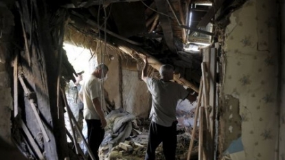 Ukraine shelling kills four civilians, soldier