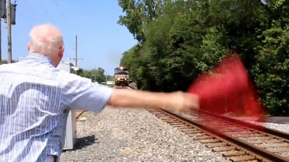 Train hits stranded limo in Indiana