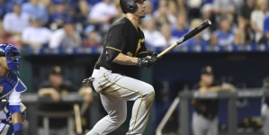 Travis Ishikawa drives in 4 as Pirates outslug Royals