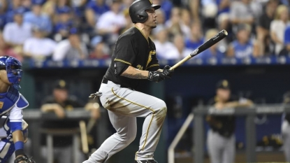 Travis Ishikawa drives in 4 as Pirates outslug Royals