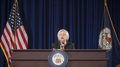 Fed: No rate hike just yet despite job gains