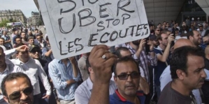 Uber suspends lowest-cost service in France after managers charged, Uber