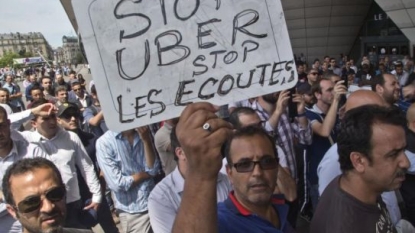 Uber suspends lowest-cost service in France after managers charged, Uber