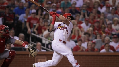 Wong’s slam paces Cardinals’ 4-1 win over Reds