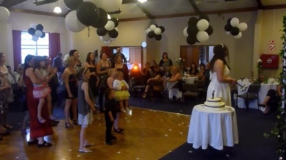 Girl drops baby to dive for bride’s bouquet