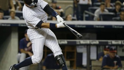 Rod hits grand slam to rally Yankees over Twins, 8-4