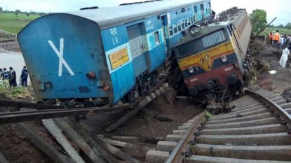 At least 21 dead after two trains derail in central India