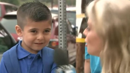 Back to school: TV reporter makes boy cry