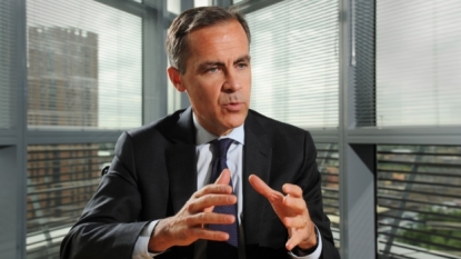 Bank of England freezes interest rate, but hikes growth forecast