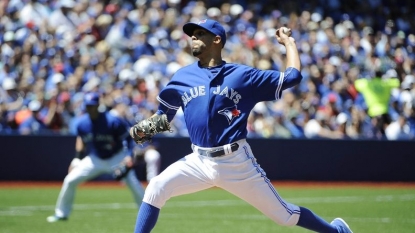 Behind Buehrle, Jays complete sweep of Twins