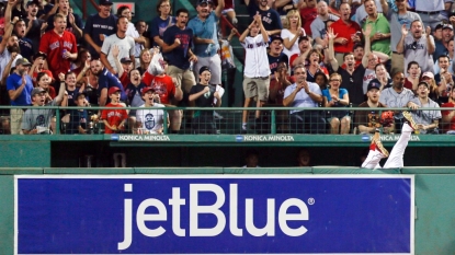 Betts hurt attempting to catch Abreu home-run drive