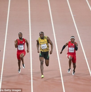 Bolt Retains 100 metres Title