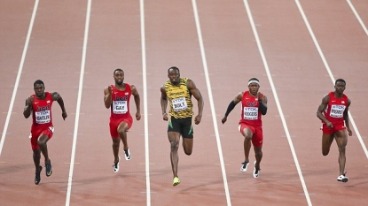 Bolt Retains 100 metres Title