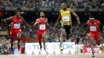 Bolt digs deep to beat Gatlin in 100m tussle