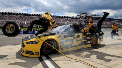 Brad Keselowski hits crew members during pit stop; both unhurt