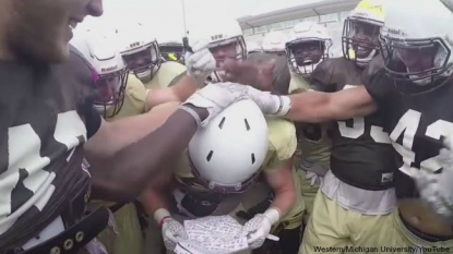 Western Michigan football team surprises walk-on with scholarship