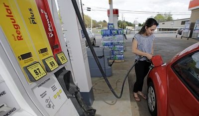 Cheap oil has pump prices headed back toward $2 a gallon