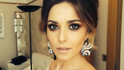 Cheryl Fernandez-Versini wore a great big collar to her perfume launch