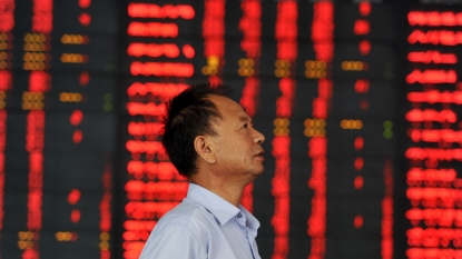 China tries to halt stock market plunge with short-selling curbs