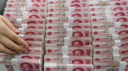 China’s yuan drops for a third day