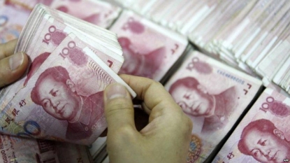 China’s yuan slides in value after Beijing alters controls