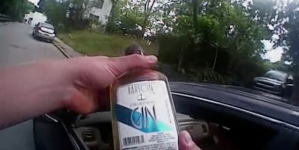 Coroner says slain Ohio motorist’s bottle not booze