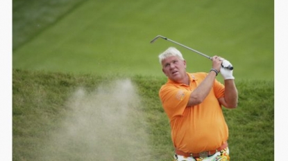 Daly puts 3 balls and 1 club into Lake Michigan