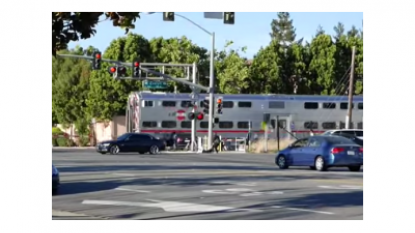 Dramatic footage shows officer pull man from auto moments before train hits