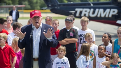 Front-runners Clinton, Trump descend on Iowa State Fair