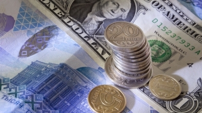 Kazakhstan floats tenge, currency tumbles