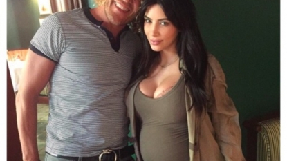 Kim Kardashian Wears Skintight Mini, Proves Her Bump Is Beyond Real