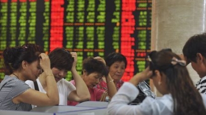 Chinese shares end lower despite Beijing’s renewed support