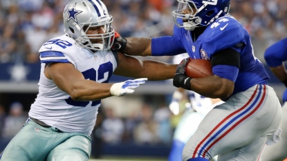 Jeremy Mincey ends holdout, Cowboys give him a raise