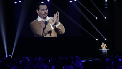 Johnny Depp makes surprise appearance at Disney convention