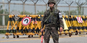 The Latest on Koreas: S. Korean leader visits border base